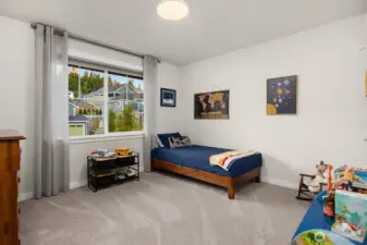 A large closet provides ample storage for this bedroom.