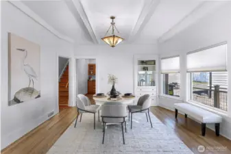 Wonderful dedicated dining room space with bay windows
