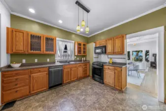 Lots of counter space with oak cabinetry