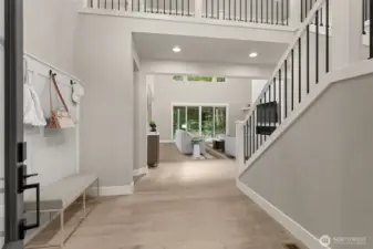 Home is under construction. Photos of a previously built home with similar finishes that are virtually staged. Builder reserves the right to make changes to plans & specifications without notice. Features vary by plan. Buyer to verify square footage.