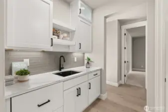 Home is under construction. Photos of a previously built home with similar finishes that are virtually staged. Builder reserves the right to make changes to plans & specifications without notice. Features vary by plan. Buyer to verify square footage.