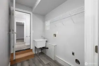 Laundry room off primary bathroom