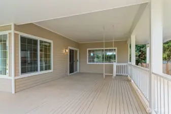 The covered porch is the perfect place for entertaining or simply relaxing after a long day.