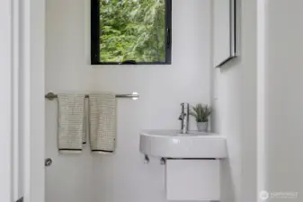 There is an en-suite 1/2 bath in the primary