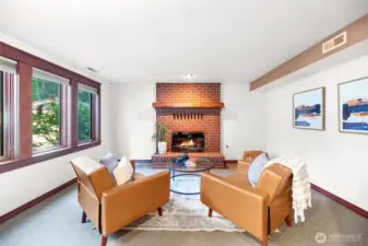 Downstairs bonus room with gas fireplace.