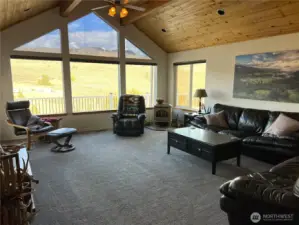 Vaulted ceilings and large windows for natural light.