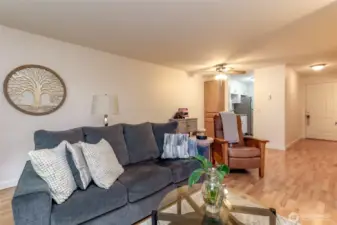 Upon entry, you are greeted by an open living space with polished easy-care flooring.