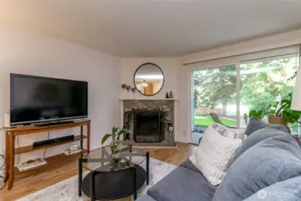 A comfortable living space full of natural light with flexible seating options.