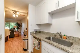 This cheerful kitchen has ample storage space.