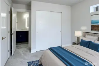 Bright, airy, and conveniently connected to the dual-entry bathroom