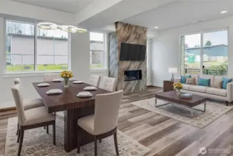 Light filled open concept living and dining on main level