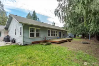 Unit A - This is the exterior of unit A with a deck off the living room.