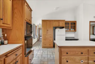 Unit B - kitchen to hallway which leads you to full bathroom & bedroom 2 plus bonus room.