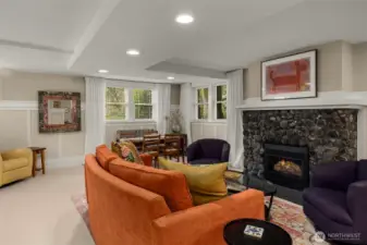 The original river rock fireplace has a gas insert.