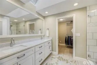 Master bathroom has marble counter tops, toilet area has privacy door and toto toilet.