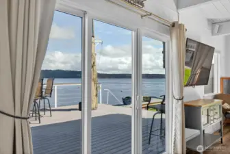 Big sliders & windows fill the room with natural light. There is a view from almost every room.