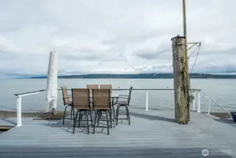 Railing around the deck and you can see the hand rail for the steps that go down to the beach.
