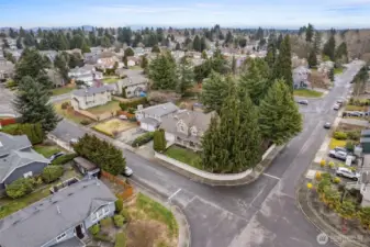 Set on an expansive 8,498 sq ft corner lot, this fully fenced property offers both privacy and flexible outdoor living—an uncommon find on Kent’s East Hill.