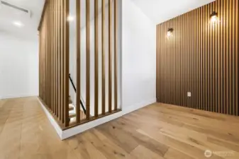 Hallway and perfect reading nook or another home office? Laundry just off of this room.
