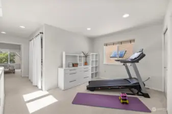 Bonus space upstairs can be used as home office or workout space