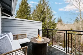 Private deck that overlooks a greenbelt.