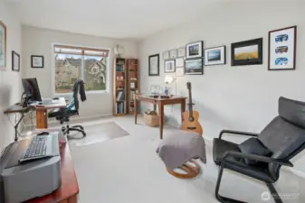 The fifth bedroom on the upper level currently serves as a bonus room.
