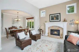 Living room showing adjacent formal dining room.