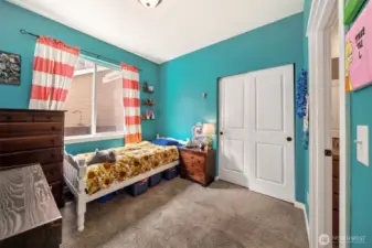 Jr. Primary Suite located on the main floor w/ full bathroom attached to the right.