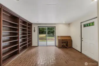 Family room/library/bonus room opens to backyard.