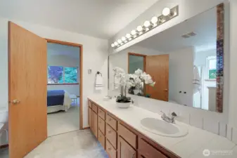 Primary bathroom with dual vanities