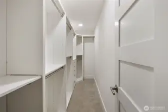 Spacious, finished walk-in closet off main bedroom