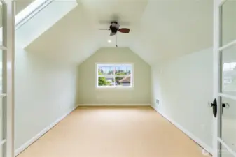 2nd floor perfect room for crafts, office or play room. Skylight adds to this room light & bright feeling. All it needs is flooring to complete this perfect space.