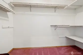 Walk-in closet on the primary suite floor.