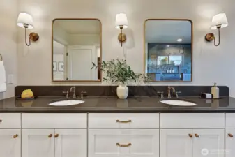 Put on a fresh face every day with dual vanities and tons of storage space.