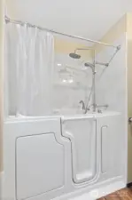 New walk-in tub/shower.