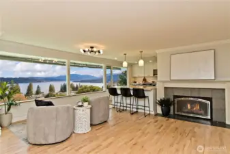 Wall of windows fill the space with sunlight and frame the stunning panoramic view.