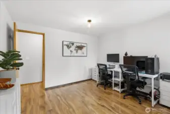 Main level room has many possibilities. Great home office, main floor bedroom or flex space.