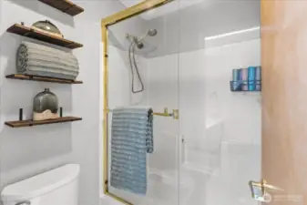 Primary ensuite offers vaulted ceilings, full bath and walk in closet.