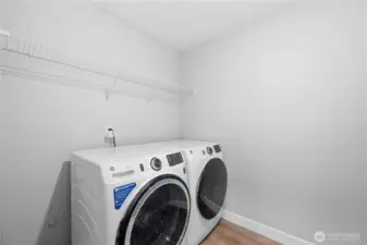 Convenient upstairs laundry located near the bedrooms.