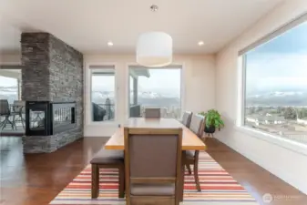 Dine with views & a cozy 3-sided fireplace