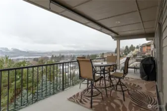 Expansive covered deck with gas plumbed to BBQ. VIEWS!