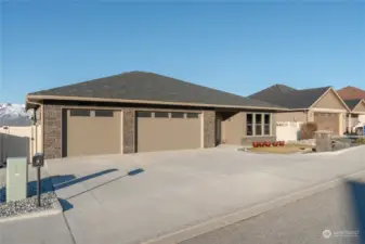 Immaculate daylight basement home with 3 car garage