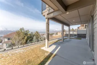 Covered patio out to low maintenance yard.. VIEWS!