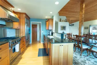 Kitchen and dining room taken from the kitchen eating nook. Note the Viking gas range and Sub Zero refrigerator