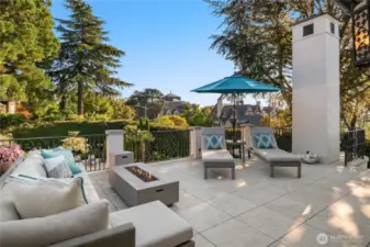 The upper patio off of the bonus room. You can see the beginning of the curved staircase that leads to the lower level to the right in this photo.