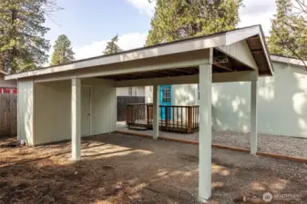 Detached carport and storage shed