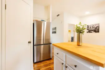 Large walk-in pantry and large butcher block island