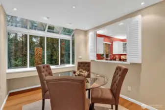 Pass thru window from the kitchen-potential to remove upper walls and create an eating bar or extra seating and serving