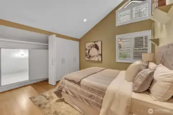 A second ensuite bedroom fills out the upstairs, with vaulted ceiling and wall to wall closet, with additional finished storage space accessible thru the back of the closet.