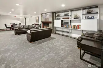 Lower level lobby living room, dining room and library